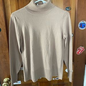 Woman’s Cable and Gauge Sweater